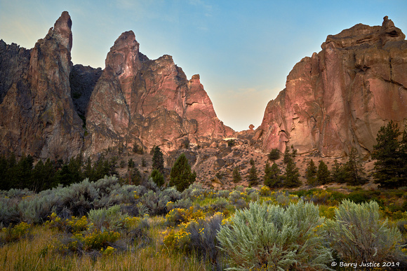 Early morning muted colours at Smith Rock due to wildfire smoke around the hills
